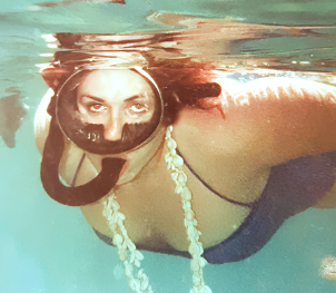 Snorkeling in St.Thomas after we were kicked out of St. John for feeding fish, 1984